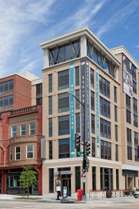 14 w exterior showing a six story residential building and commercial development - jefferson apartment group