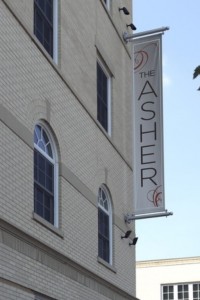 asher banner on exterior - jefferson apartment group