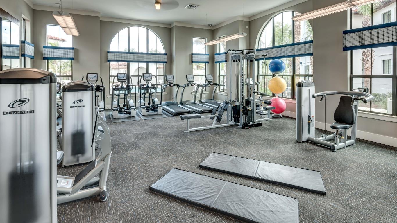 jefferson monterra fitness center with large windows, exercise balls, strength training machines and cardio equipment - jefferson apartment group