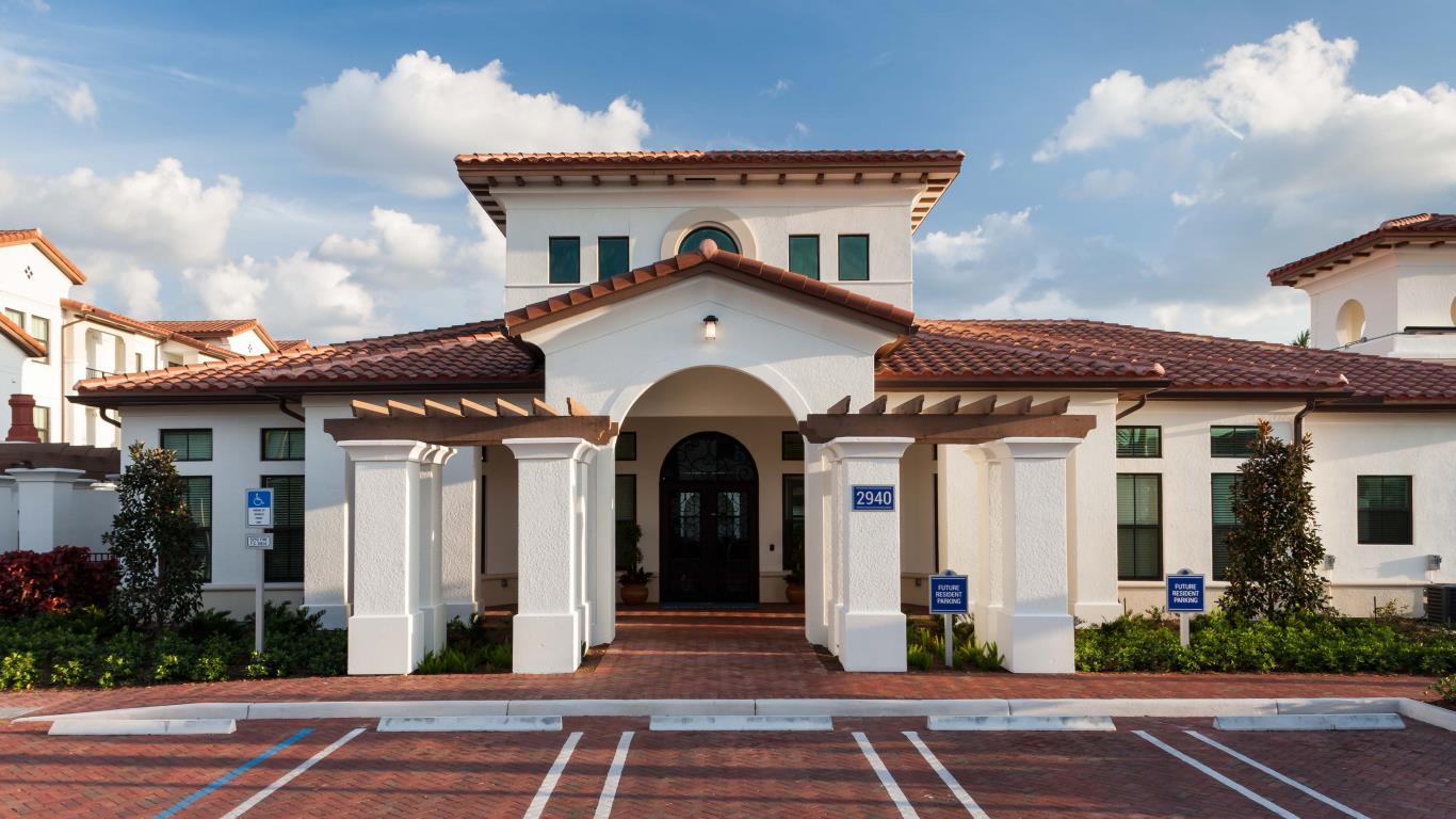 jefferson montera exterior with spanish tiled roof and parking area - jefferson apartment group
