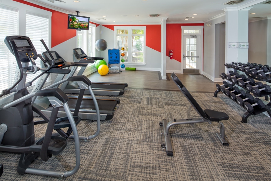 arbors at broadlands fitness center with cardio machines, flat screen tv and free weights - jefferson apartment group