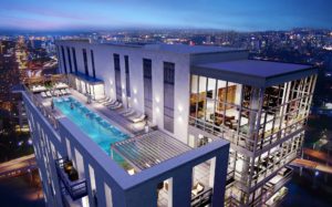 j sol aerial view of rooftop pool, outdoor living space, and resident club room - jefferson apartment group