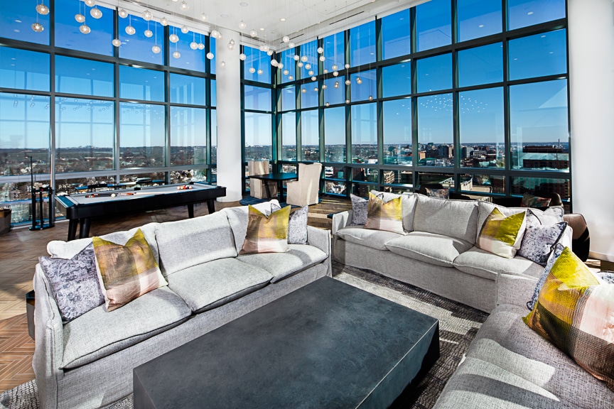 resident sky lounge with social seating, billiards and a view of washington dc at j sol luxury apts