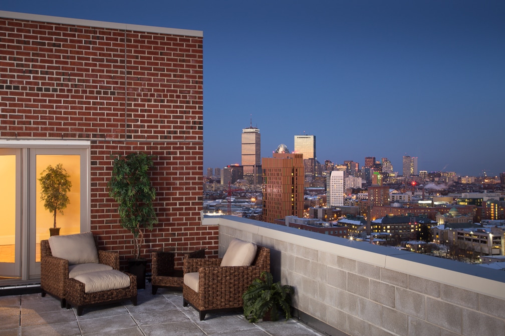 cityview at longwood Roofdeck with dusk view of Boston skyline - jefferson apartment group
