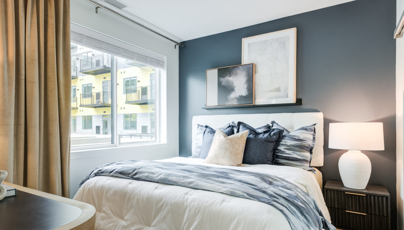 bedroom bed by window Rivermark Northern Liberties luxury apartments Philadelphia PA