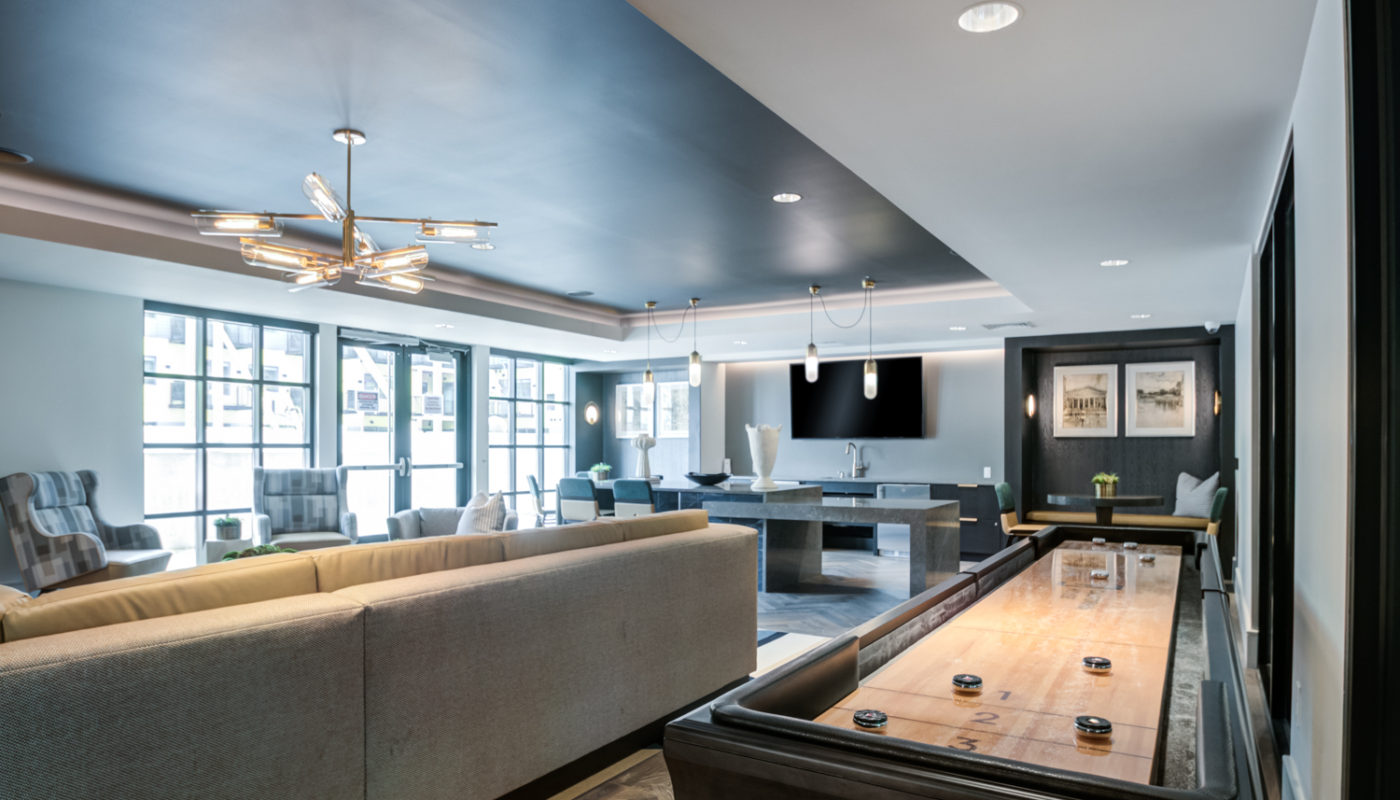 clubroom seating and shuffleboard Rivermark Northern Liberties luxury apartments Philadelphia PA