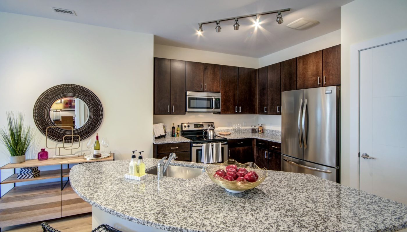 kitchen with large curved island - Annapolis Junction MD luxury apartments