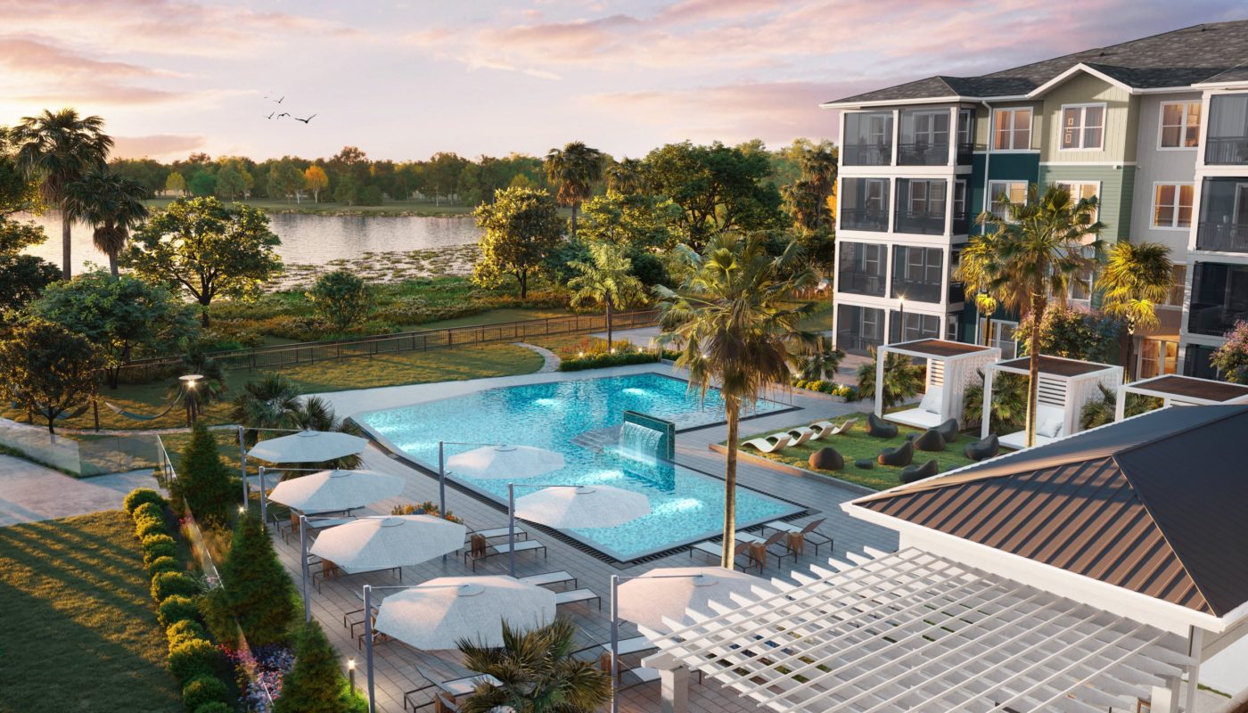 pool with lounge chairs overlooking lake at dusk apopka FL apartments