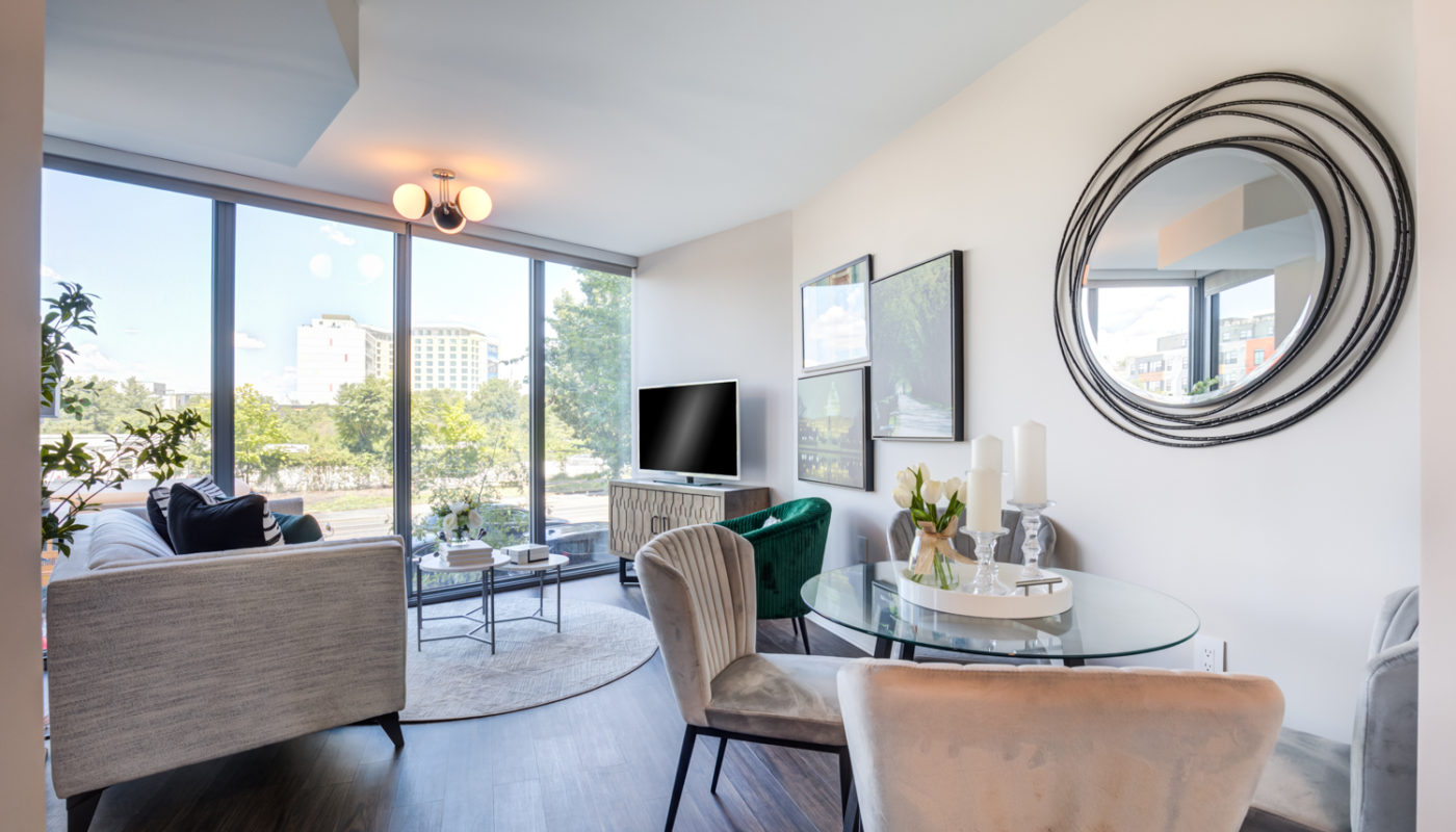 dining table and chairs and living room Pinnacle NoMa DC luxury apartments