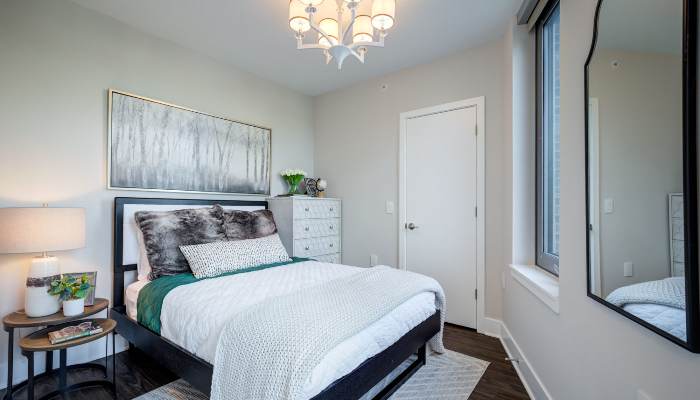 bedroom bed and dresser Pinnacle NoMa DC luxury apartments