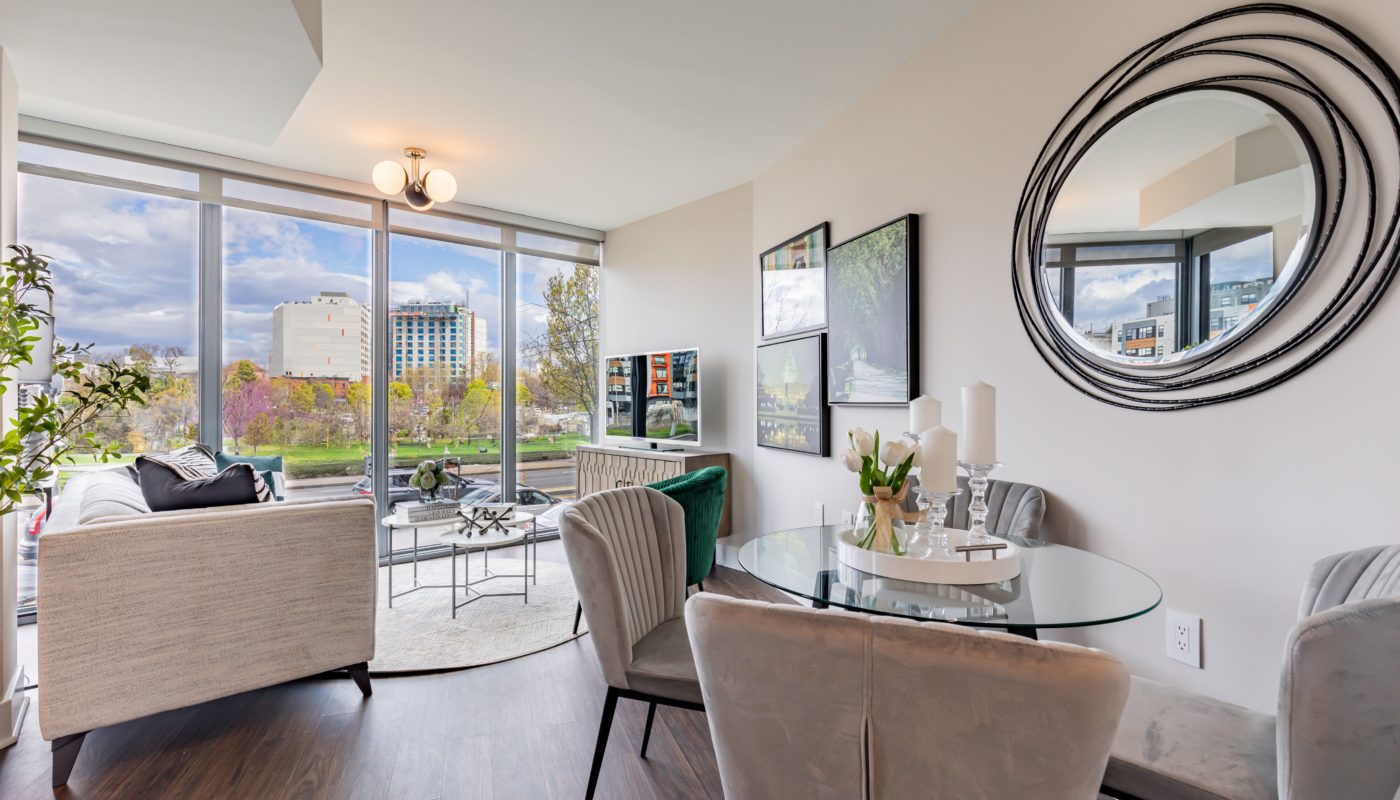 dining table with chairs and living room Pinnacle NoMa luxury apartments in DC