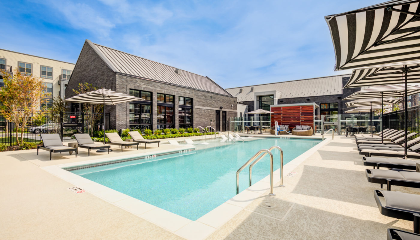 pool with daybeds and lounge chairs EDE luxury apartments Frederick MD