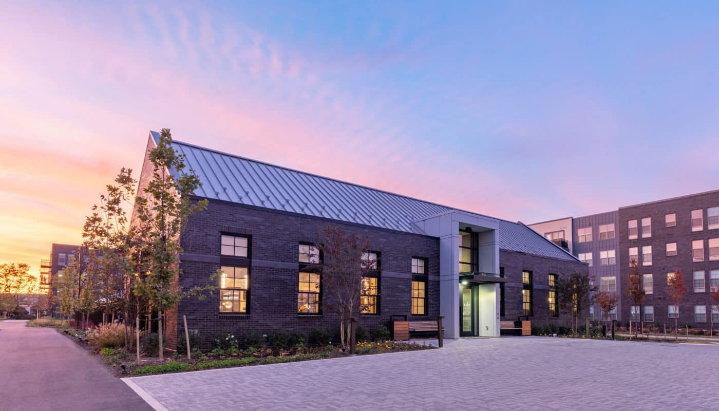 clubhouse entrance exterior dusk EDE luxury apartments Frederick MD