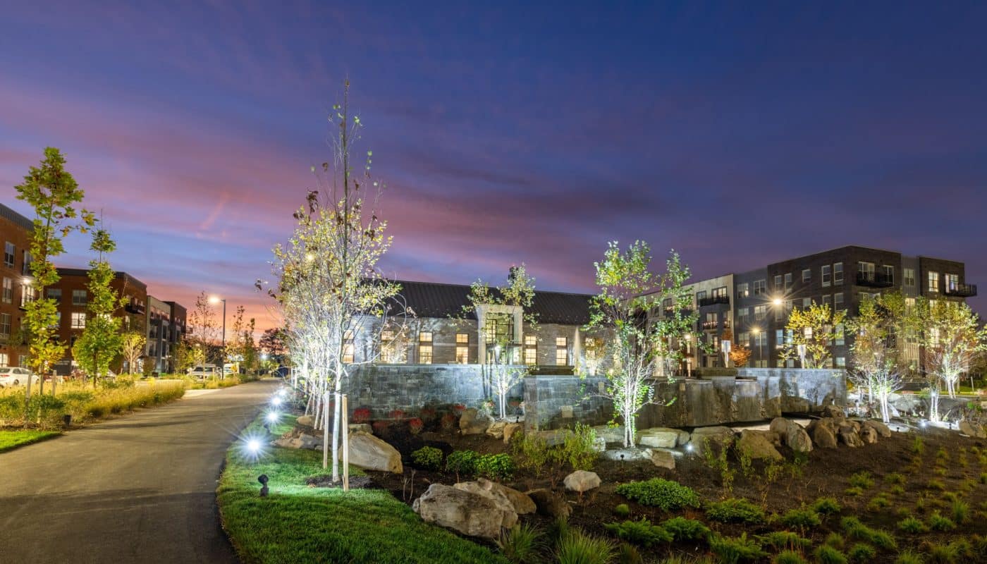 entrance water feature with trees and plants EDE luxury apartments Frederick MD