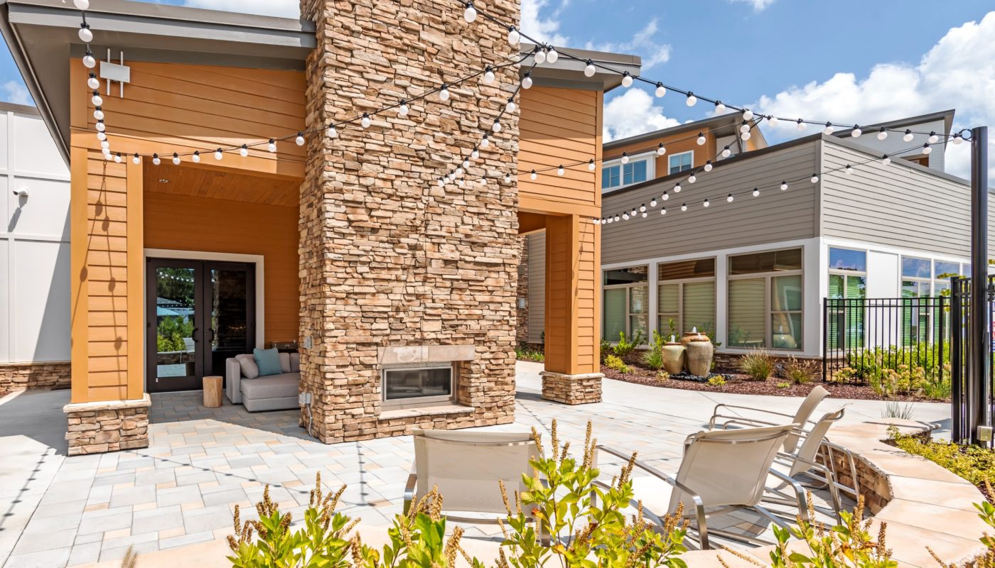 Outdoor lounge with fireplace Flats at 540 Apartments JAG Management Company