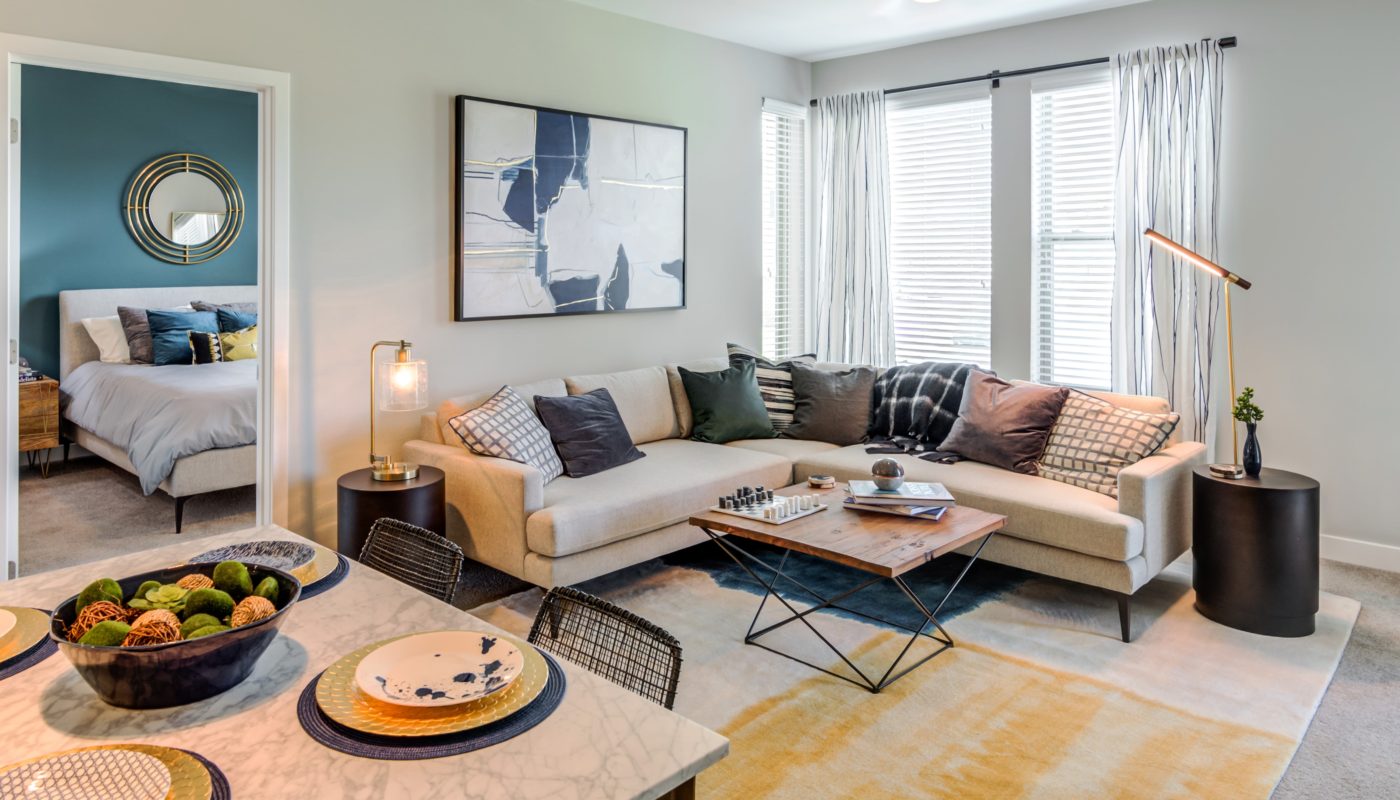 Living Area with Sectional Couch and Large Windows